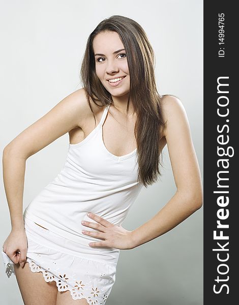 Young beautiful woman posing in studio