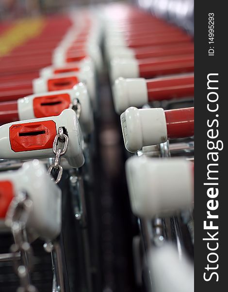 Shopping carts in front of a shopping center. Shopping carts in front of a shopping center