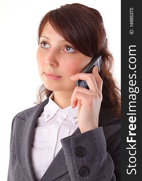 Smiling business woman talking at cell phone