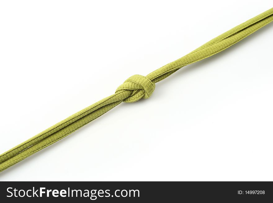 Rope with knot close up. Isolated on white background.