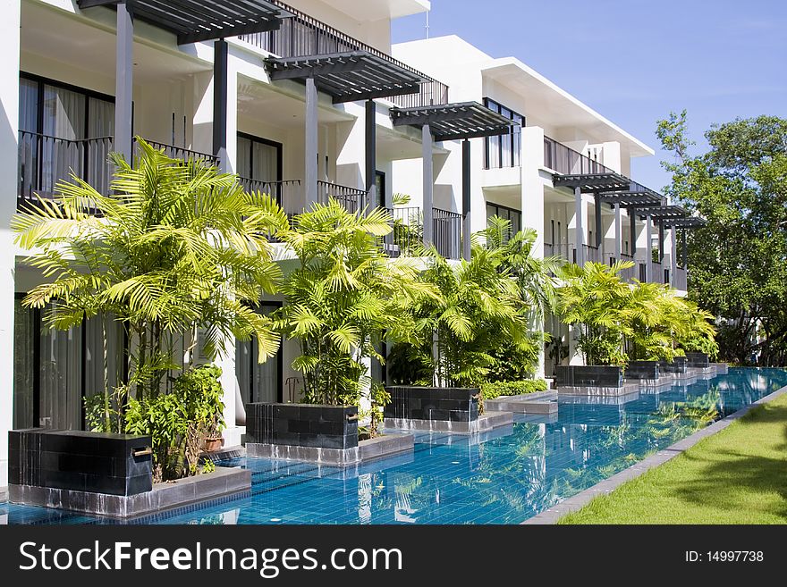 Beautiful swimming pool at an Asian resort. Beautiful swimming pool at an Asian resort.