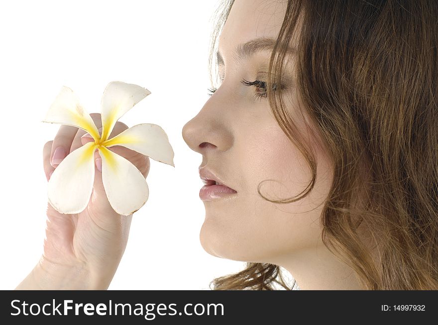 Close-up of a woman's hands holding Frangipani. Close-up of a woman's hands holding Frangipani