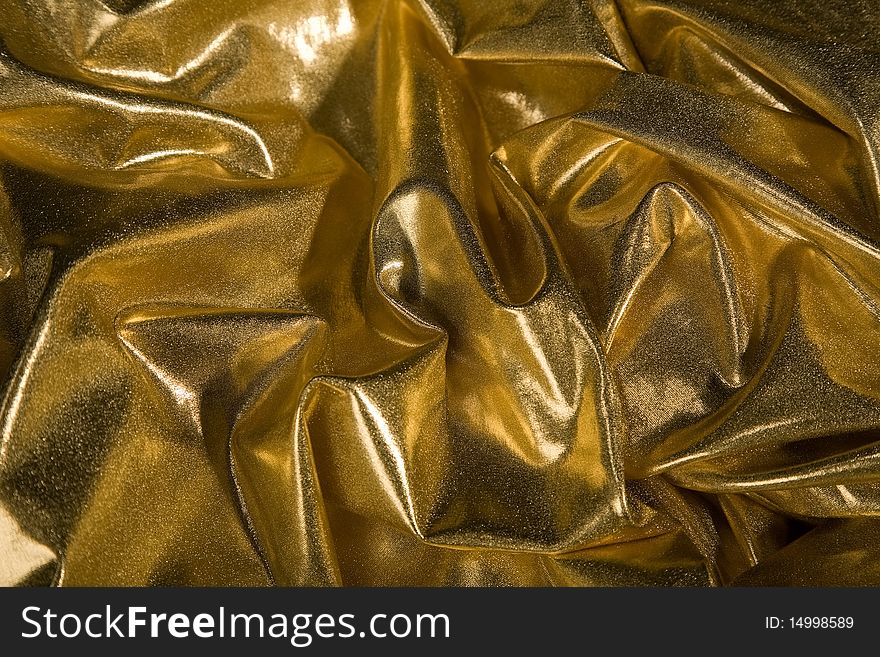 Close-up picture of elegant gold fabric fold
