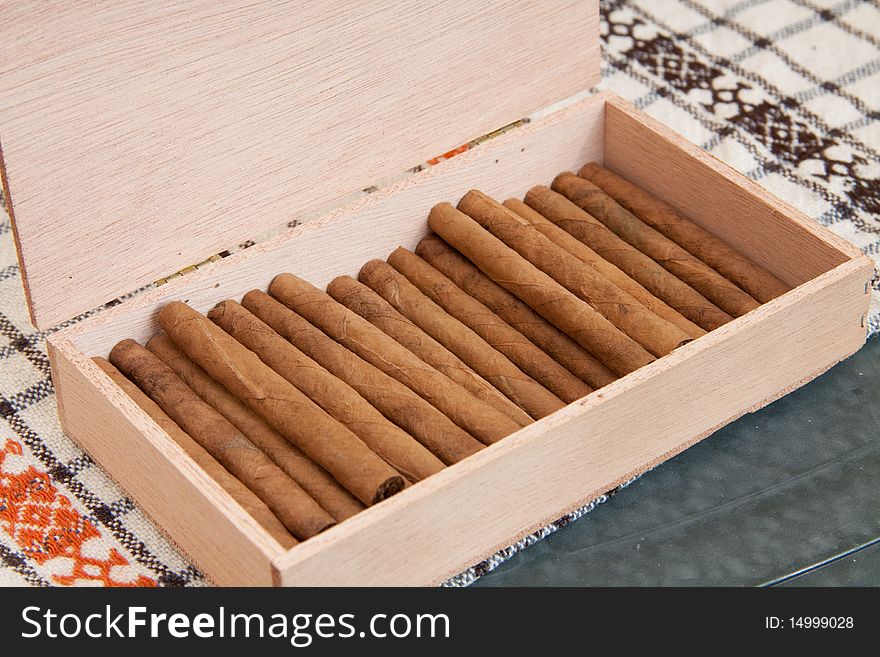 A box of Cigars standing on the table