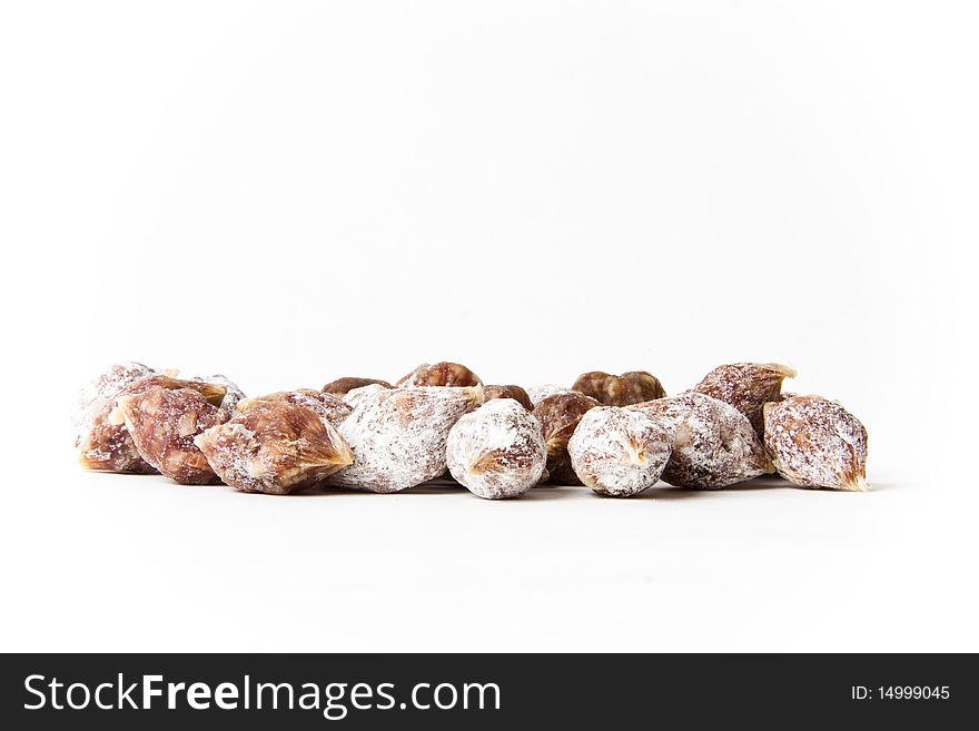 A few Mini salamiÂ´s against a white background