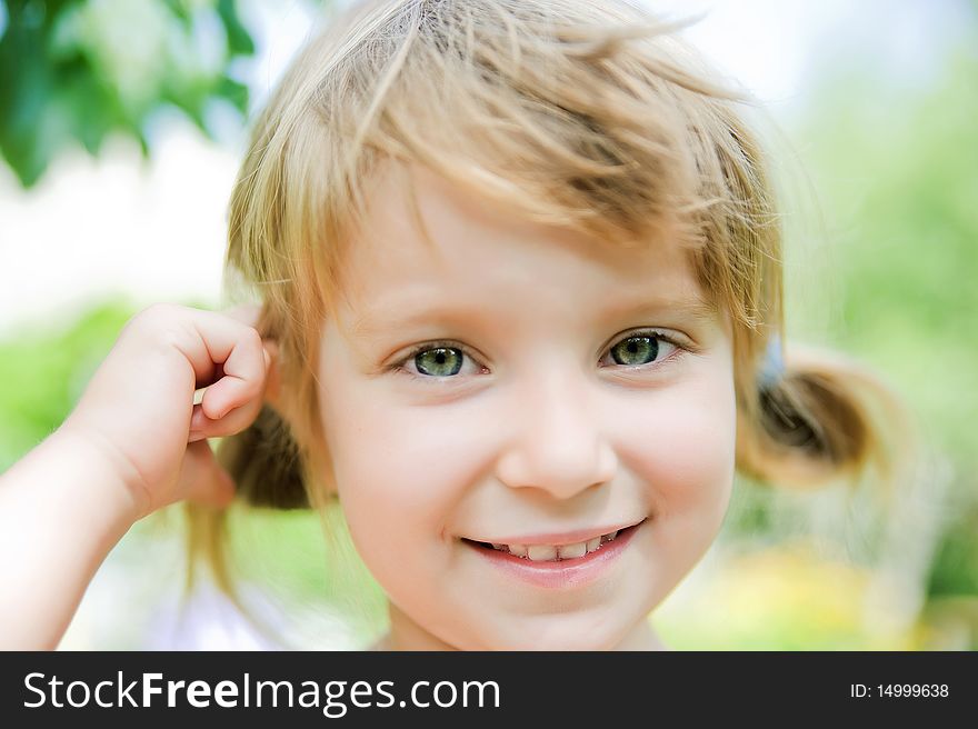 Portrait of a cute liitle girl close-up