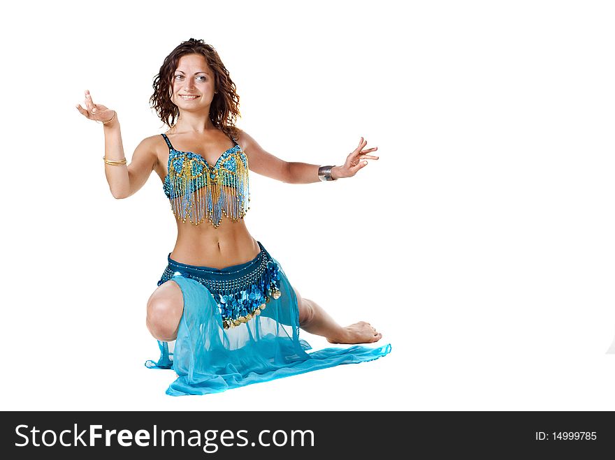 Young Belly dancer posing sitting on the floor