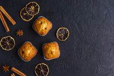 Sweet Muffins With On Dark Textured Background. Stock Photography