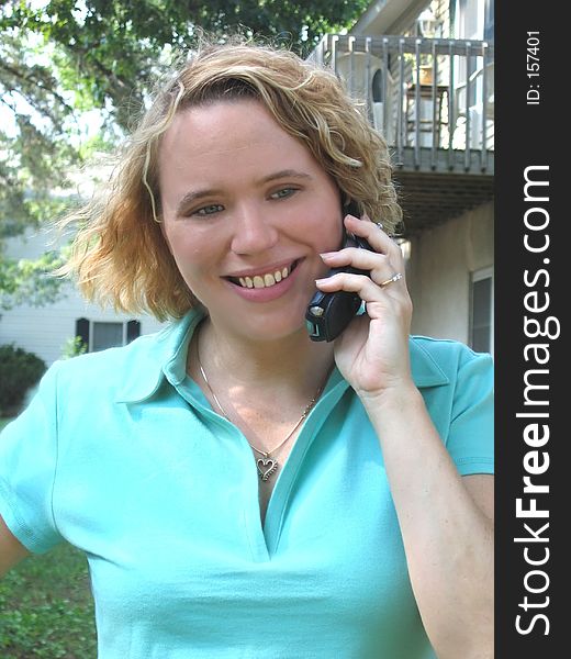 Young woman on the phone outdoors