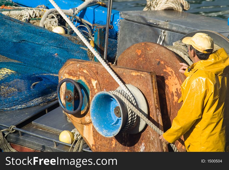 A fisherperson on the ship