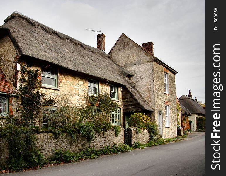 Row of Quaint Cottages in a Rural Village Street in England. Row of Quaint Cottages in a Rural Village Street in England