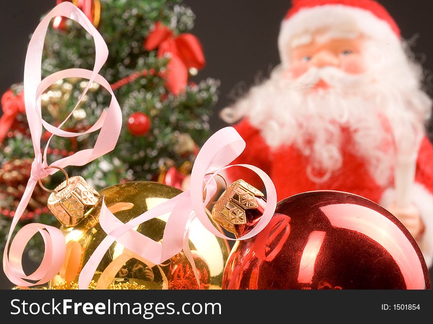 Santa with Christmas decoration on the Christmas tree background. Santa with Christmas decoration on the Christmas tree background