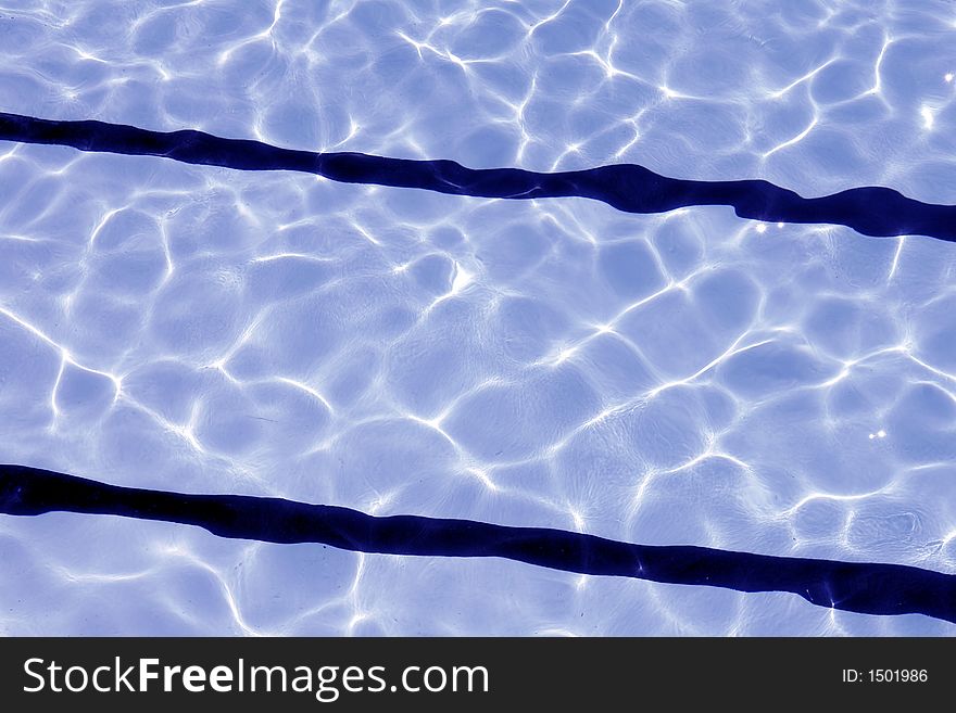Outdoor Swimming Pool Lanes With Sun Reflections. Outdoor Swimming Pool Lanes With Sun Reflections