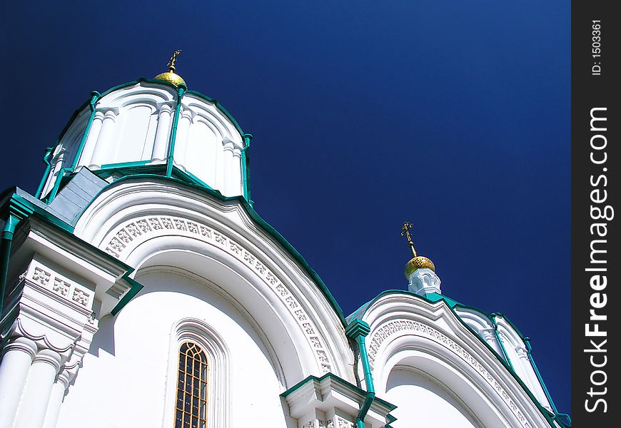 The church architecture against a deep sky background. The church architecture against a deep sky background