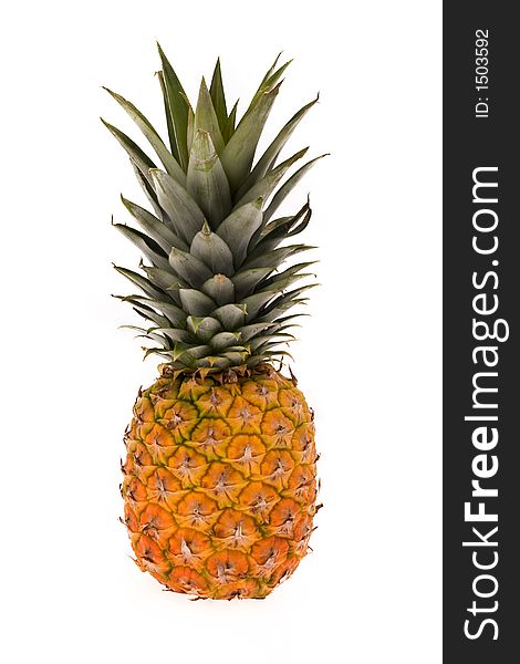 Pineapple infront of white background .