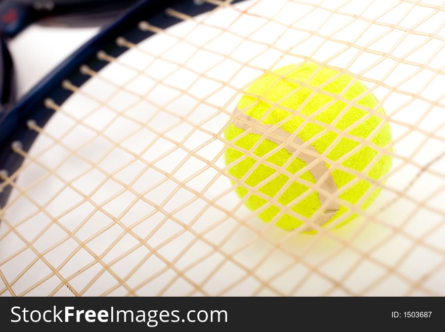 A racquet and tennis ball composition .