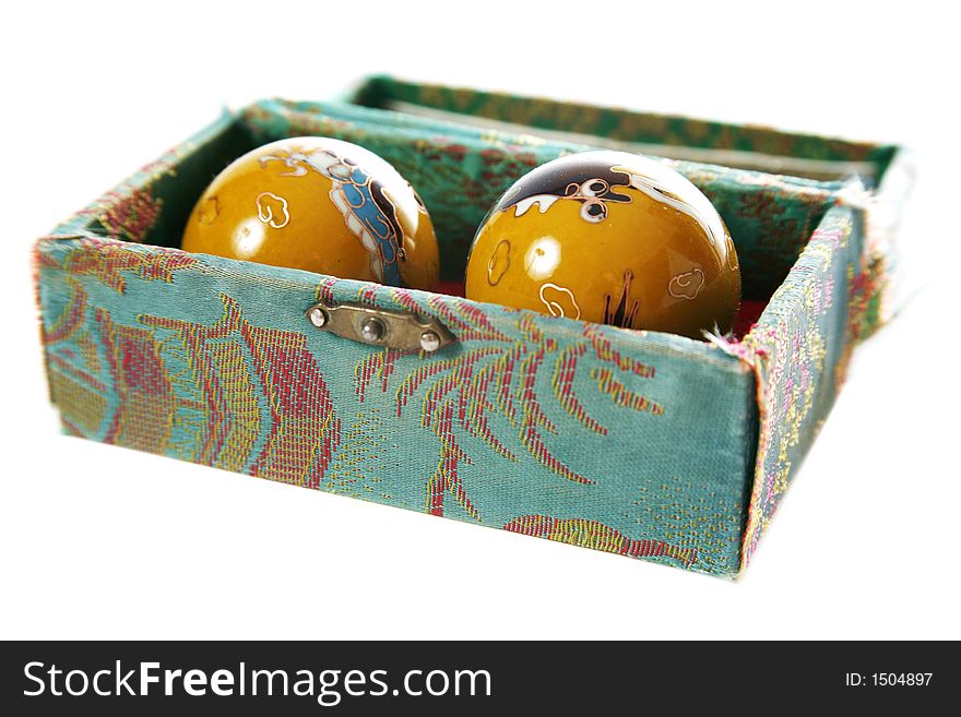 Traditional Chinese massage balls isolated over white