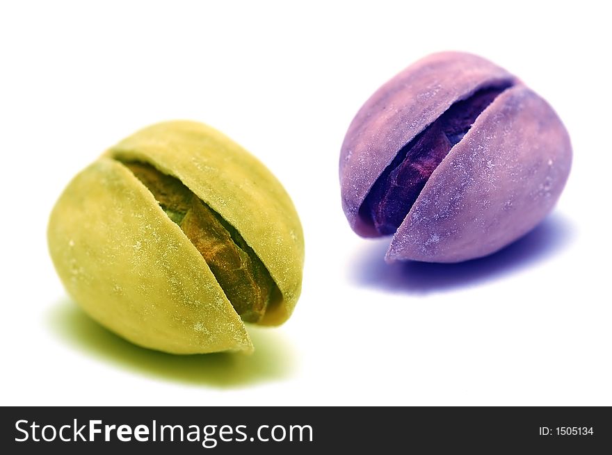 Two pistachios isolated on white background. Two pistachios isolated on white background