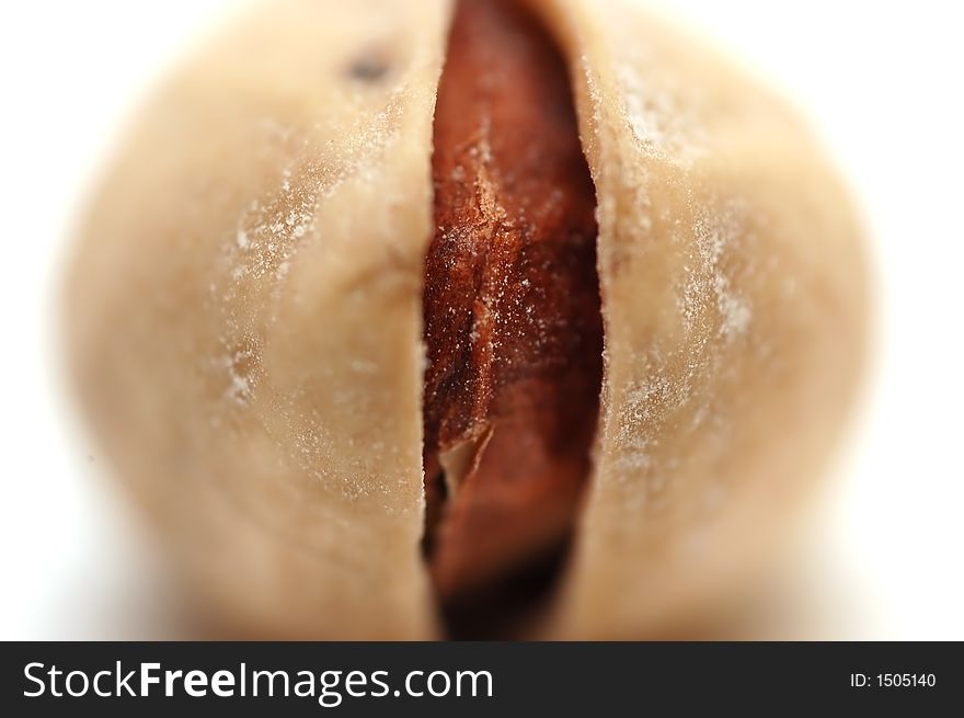 One pistachio isolated on white background