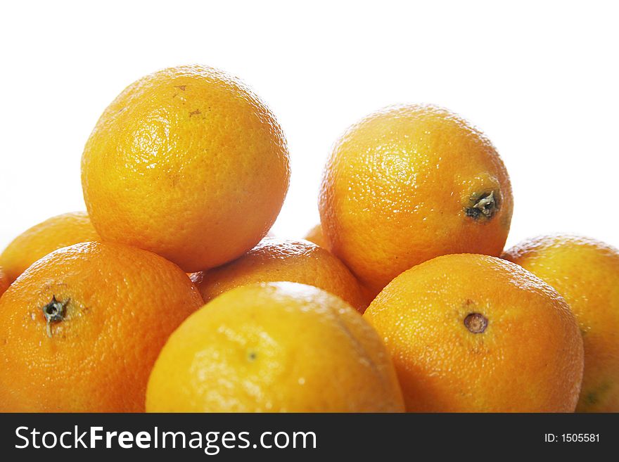 Stack of clementines isolated on white background