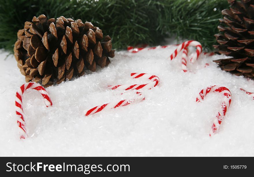 A christmas setting complete with snowflakes and candycanes