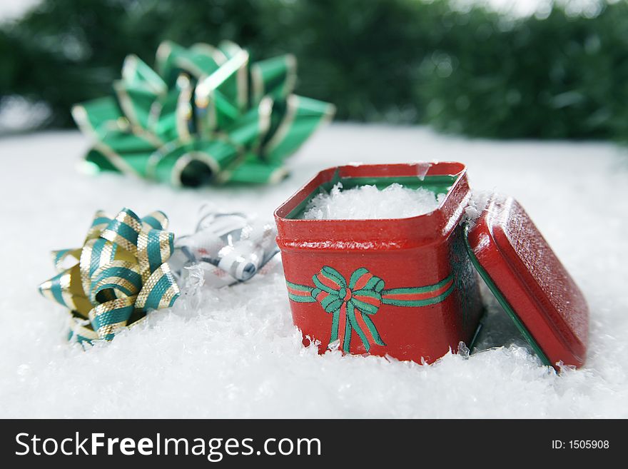 A christmas setting complete with snowflakes and bows