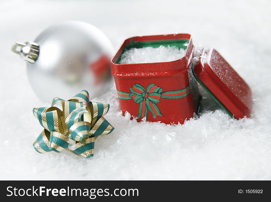 A christmas setting complete with snowflakes and bows