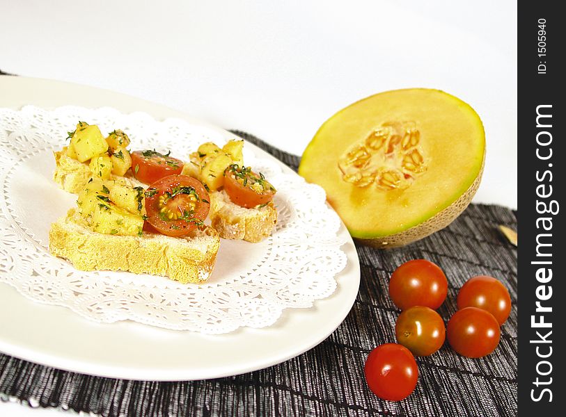 Vegetarian melon and tomato appetizer. Vegetarian melon and tomato appetizer