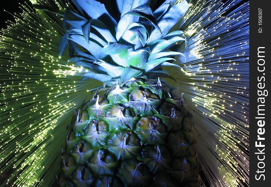 Pineapple in a stream of particle. Pineapple in a stream of particle