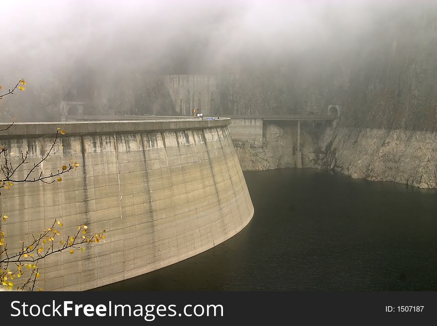 Vidraru Dam in autumn - Romania, 166 m hight, 465 millions mc, build in 1966. Vidraru Dam in autumn - Romania, 166 m hight, 465 millions mc, build in 1966