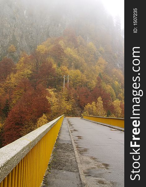 Bridge to mist in Transfagasan climbing at 2034 m high in Fagaras Mountains