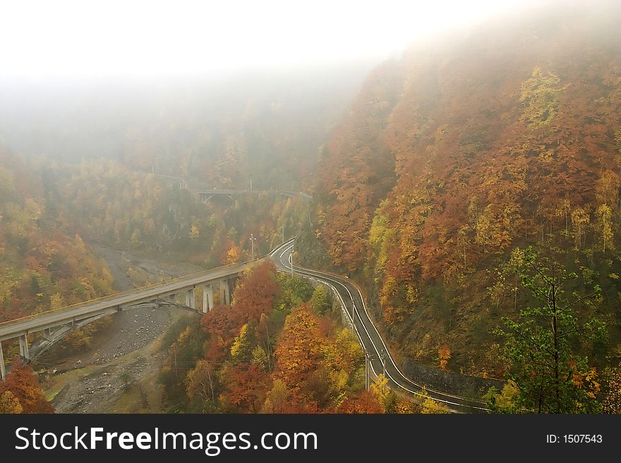 Roads in mist on Transfagarasan climbing at 2034 m high in Faragars Mountains