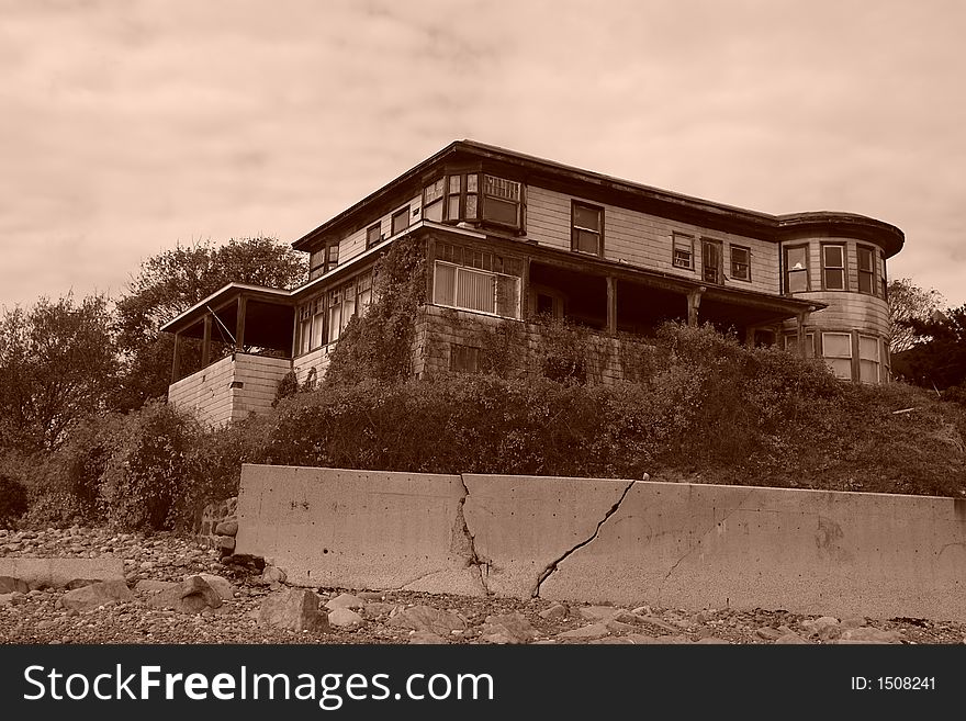 Old abandoned beach house sepia