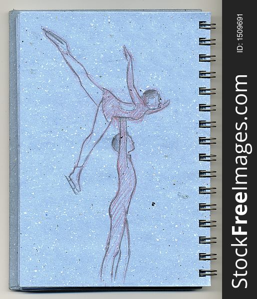 A drawing of two figure skaters drawn with pencils on a blue sketchbook. A drawing of two figure skaters drawn with pencils on a blue sketchbook