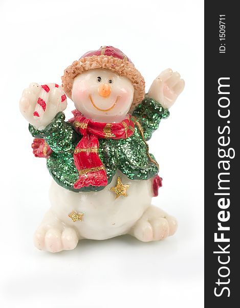 Miniature Snowman statues in different poses against white background with clipping paths. Miniature Snowman statues in different poses against white background with clipping paths