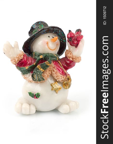 Miniature Snowman statues in different poses against white background with clipping paths. Miniature Snowman statues in different poses against white background with clipping paths