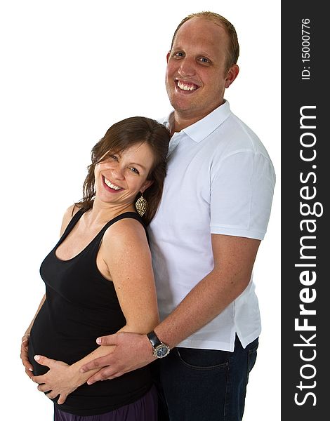 Young couple standing in studio setting isolated over white background. Young couple standing in studio setting isolated over white background.