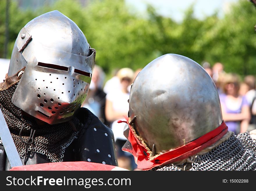 Medieval knights dressed in armor ready for battle. Medieval knights dressed in armor ready for battle.