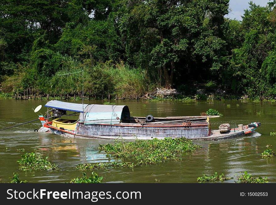 Loaded river boat in Thailand
