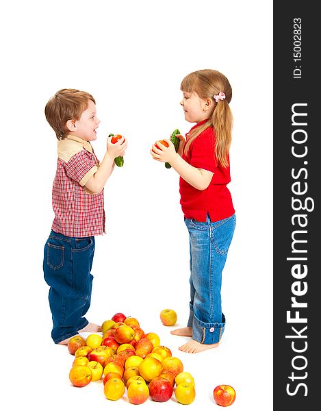 Children with fruit and vegetables isolated on white