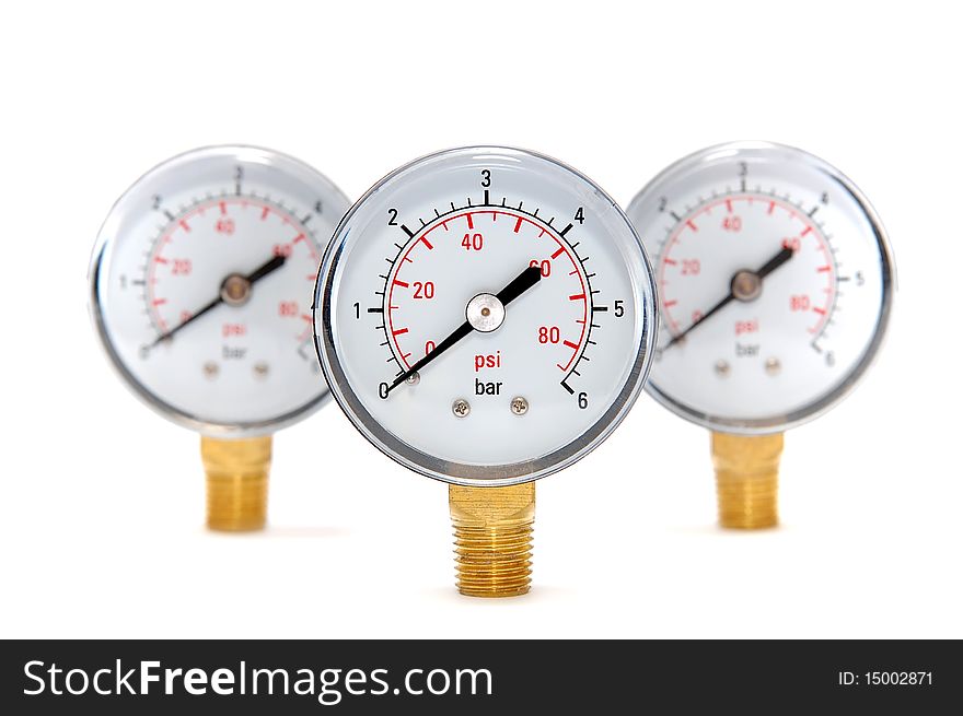 Three measuring devices on a white background