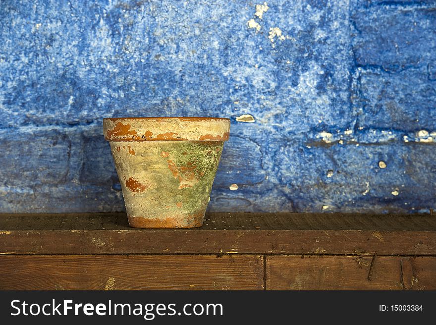 An Old Clay Plant Pot In A Potting Shed. An Old Clay Plant Pot In A Potting Shed