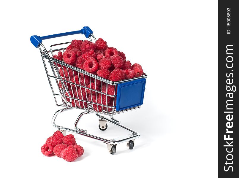 Metal shopping trolley filled with  raspberry