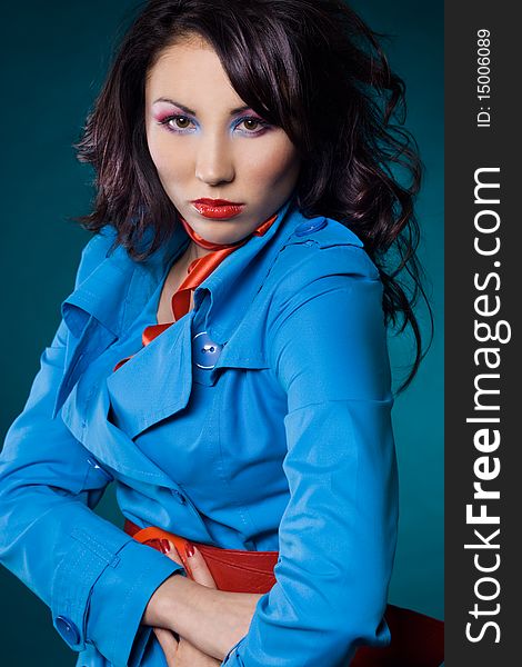 fashionable woman in blue jacket