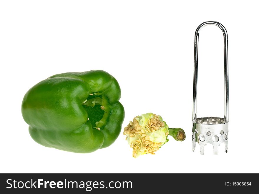 Bell pepper, core and carver tool isolated on the white background