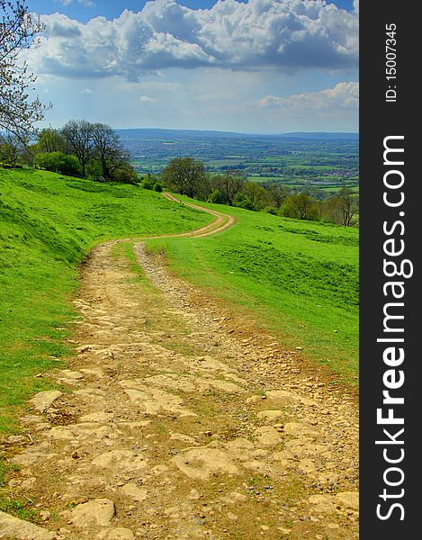 A winding trail through beautiful English countryside in the Cotswolds. A winding trail through beautiful English countryside in the Cotswolds