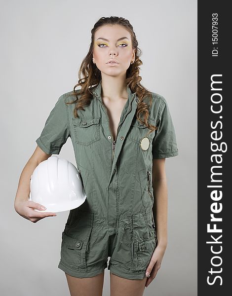 Pretty woman worker with white helmet. Pretty woman worker with white helmet