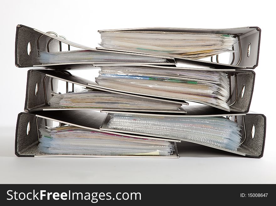 Stack Of Folders On A White Isolated Background