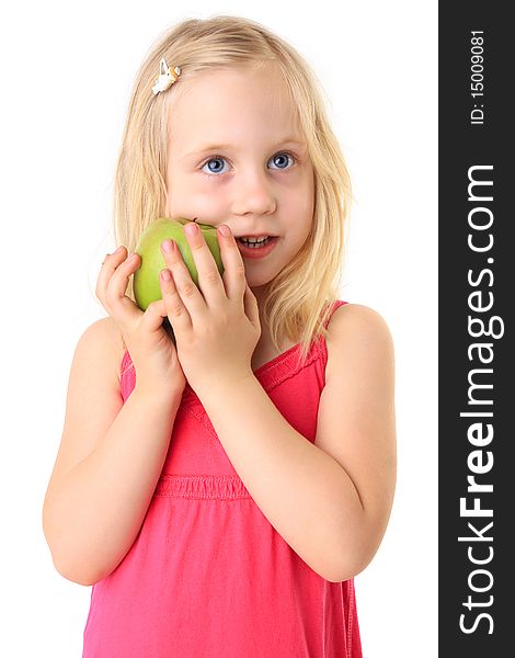 Small beautiful smiling child with a green apple. Isolated on white background