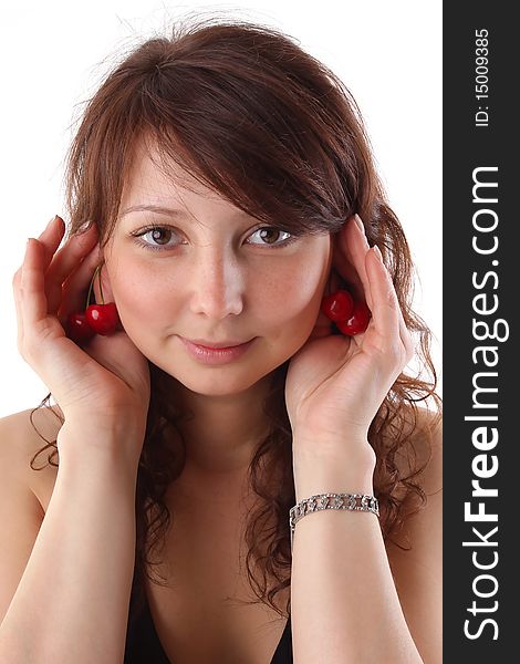 Closeup studio fashion portrait of a beautiful young sexy woman with jewelery bracelet and red cherry. Isolated on white background. Closeup studio fashion portrait of a beautiful young sexy woman with jewelery bracelet and red cherry. Isolated on white background